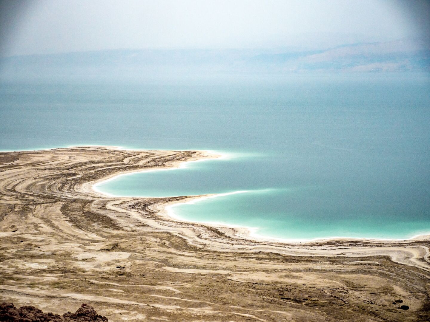 The coast line of the #DeadSea. I went to #Israel in 2017, seeing what happens there at the moment really brakes my heart. I have met so many great people there, it’s a region buzzing with history and culture and great food and so much more 
Image metadata: 35mm | 1/50s @ f2.8, ISO 400